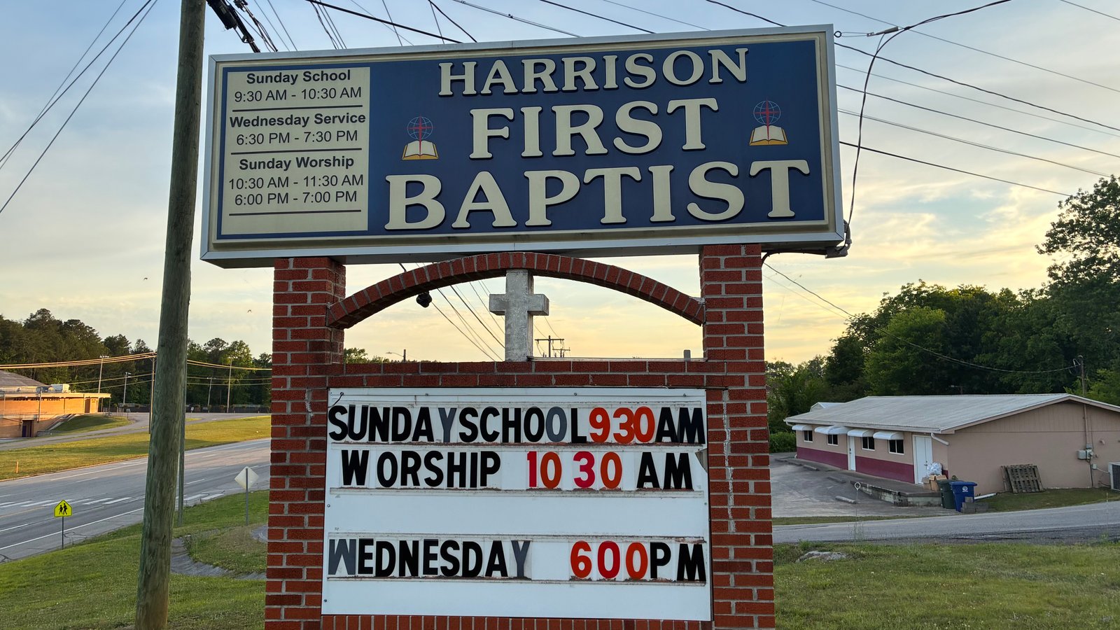 Harrison First Baptist Church sign with service times